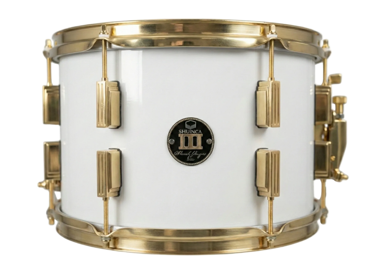 White snare drum with gold hardware on a white background
