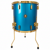 Blue drum with gold hardware on a white background