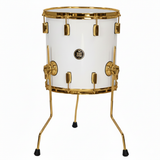 White drum with gold accents on a white background