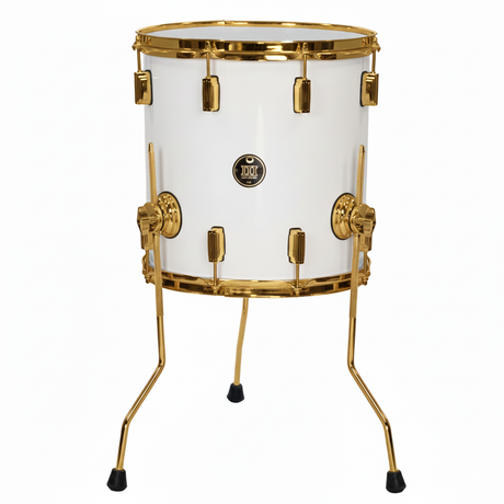 White drum with gold accents on a white background