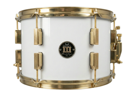 White snare drum with gold hardware on a white background