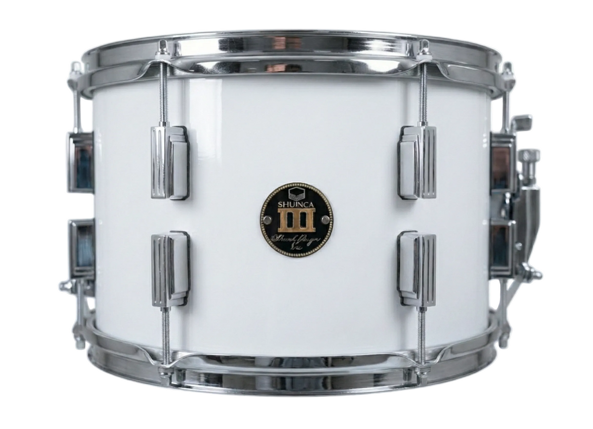 White snare drum with chrome hardware on a white background
